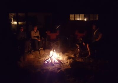 camping around fire klipstoor at boesmanskloof-diegalg